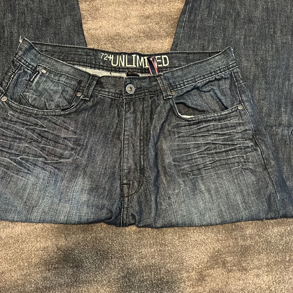 Ecko 72 Unlimited blue distressed jeans in a 34X30